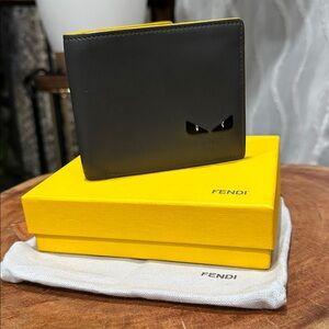 Authentic Fendi Monster Eyes Bifold Wallet Black Leather Yellow + Dust Bag + Box